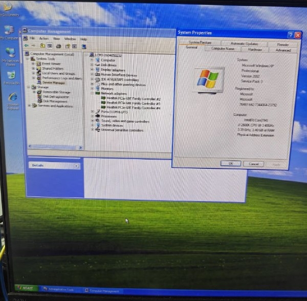 英文版 Windows XP 工控電腦系統內容與三組 Gigabit 網路介面辨識畫面